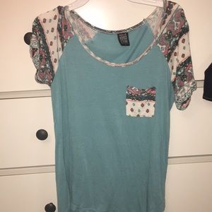 teal pocket tee with pattern
